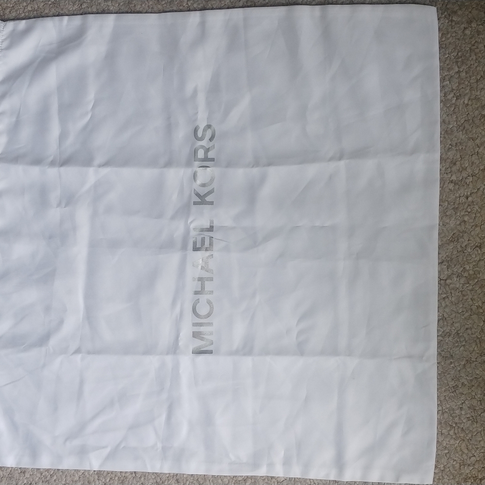 Michael Kors dust bag 21 1/2 inches by 22 inches